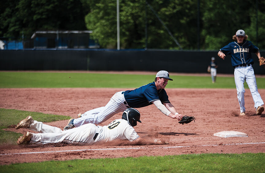 6-15jc josh slone and dawson duff both dive for first.jpg